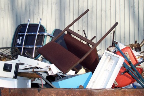 Professional home clearance team sorting items in Brent Cross