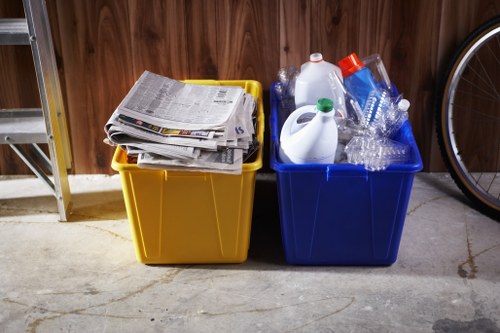 Operatives wearing PPE while handling commercial bins
